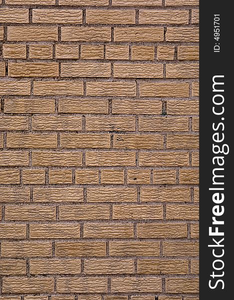 Light brown brick wall that could be used for a background. Light brown brick wall that could be used for a background