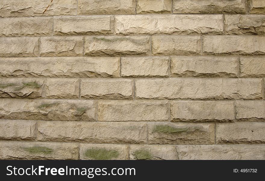 Light brown brick wall that could be used for a background. Light brown brick wall that could be used for a background