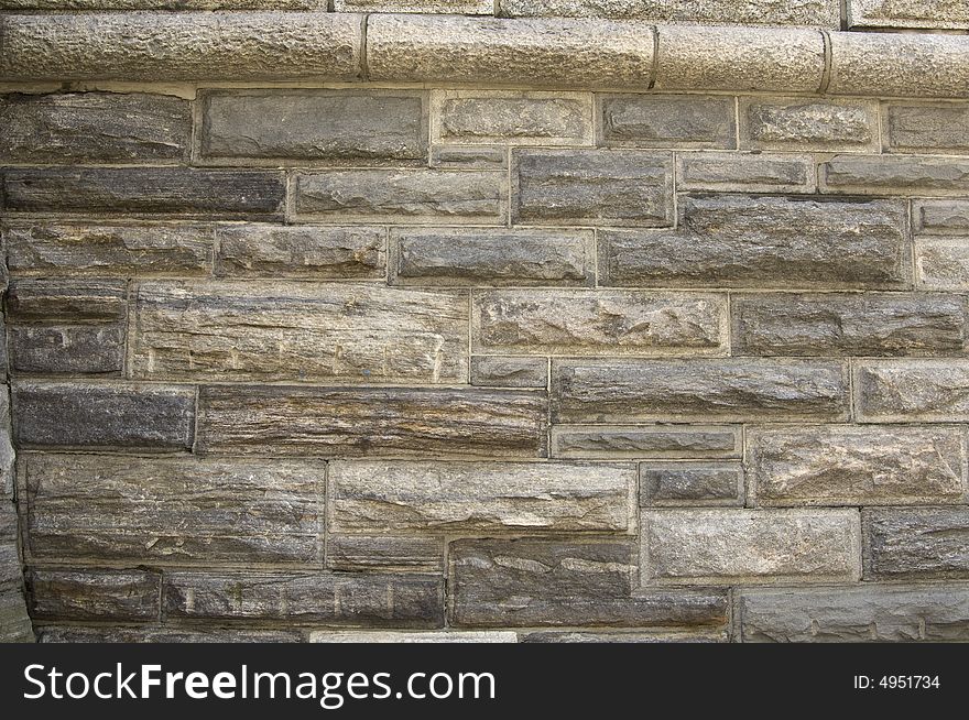 Light brown brick wall that could be used for a background. Light brown brick wall that could be used for a background