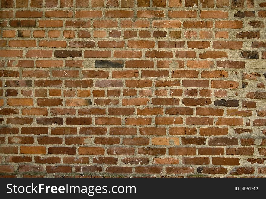 Multi colored brick wall that could be used for a background. Multi colored brick wall that could be used for a background