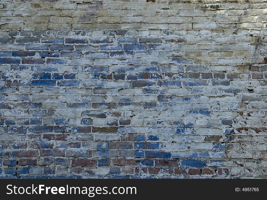 Multi colored brick wall that could be used for a background. Multi colored brick wall that could be used for a background