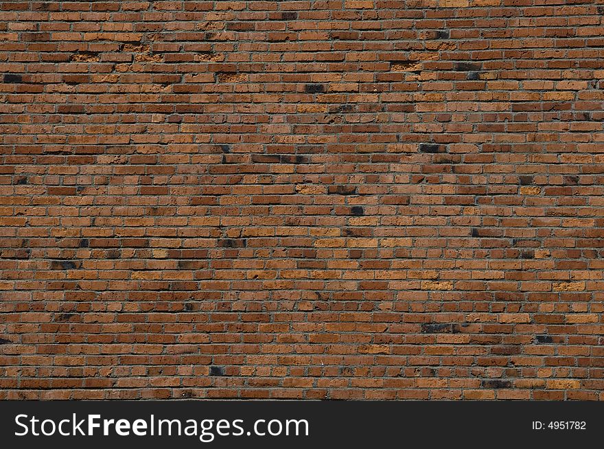 Red brick wall that could be used for a background. Red brick wall that could be used for a background