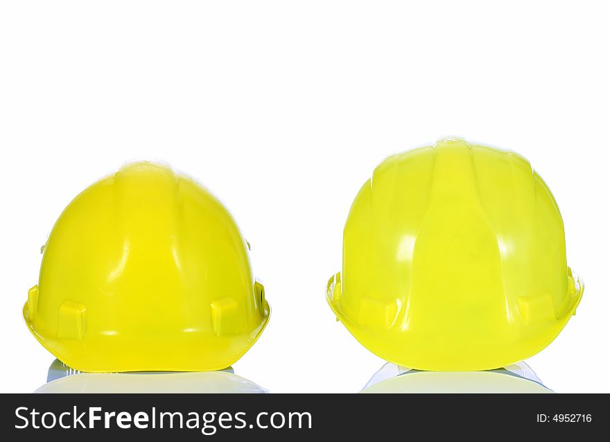 Two yellow helmet on white background