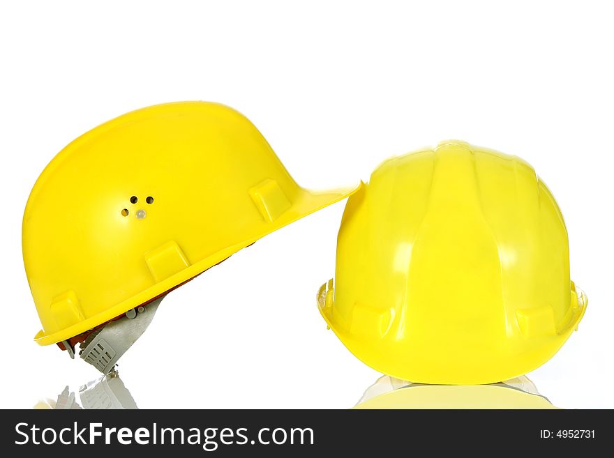 Two yellow helmet on white background