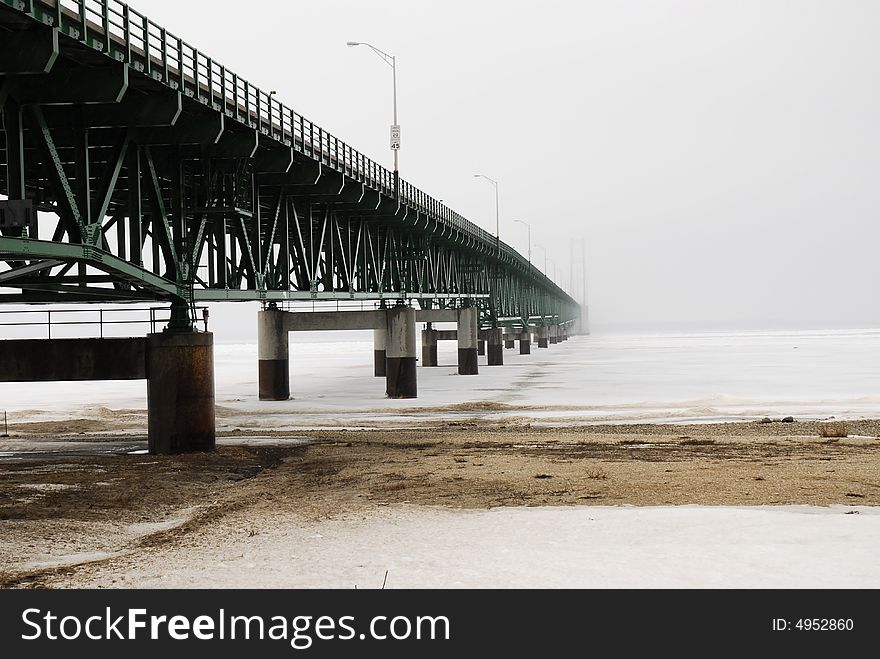 View of bridge from the South shore, with bridge towers fadeing into heavy weather. View of bridge from the South shore, with bridge towers fadeing into heavy weather.