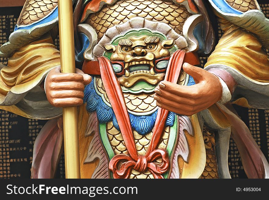 Malaysia, Penang: chinese temple; detail of a religious chinese statue