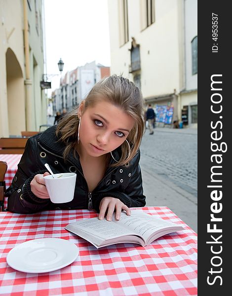 The female student in cafe street in old city. The female student in cafe street in old city