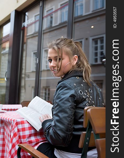 The female student in cafe street in old city. The female student in cafe street in old city