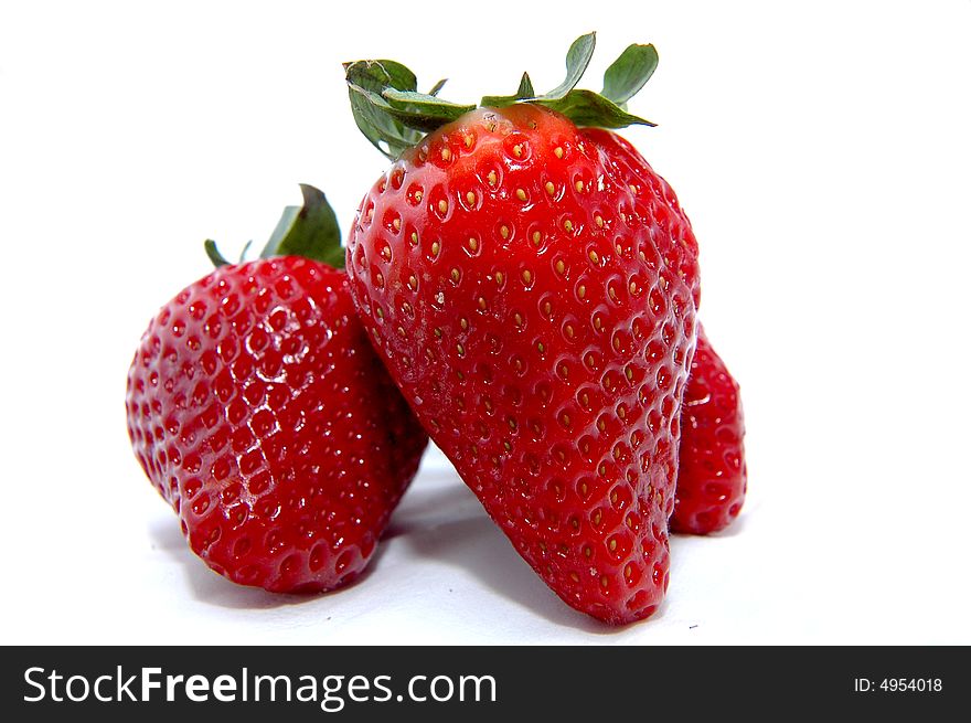 Three Strawberries in white background