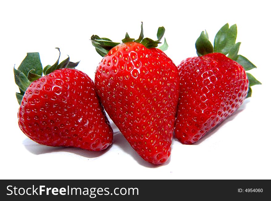 Three Strawberries in white background