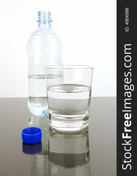 Bottled drinking water isolated against a white background. Bottled drinking water isolated against a white background