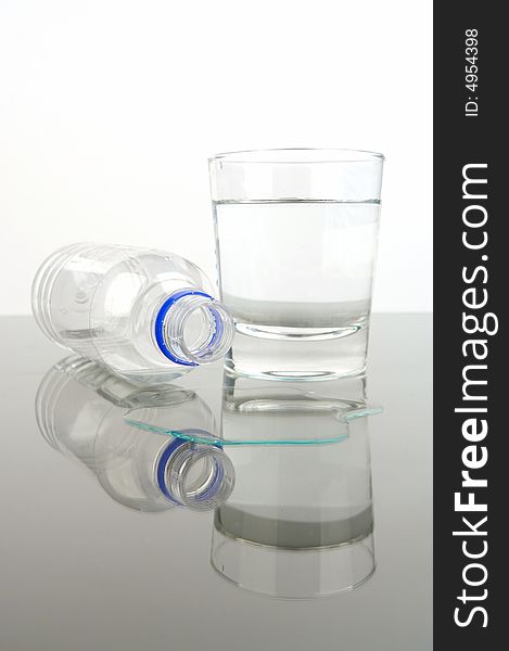 Bottled drinking water isolated against a white background. Bottled drinking water isolated against a white background