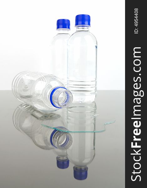 Bottled drinking water isolated against a white background. Bottled drinking water isolated against a white background