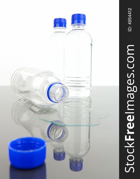 Bottled drinking water isolated against a white background. Bottled drinking water isolated against a white background