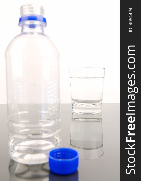 Bottled drinking water isolated against a white background. Bottled drinking water isolated against a white background