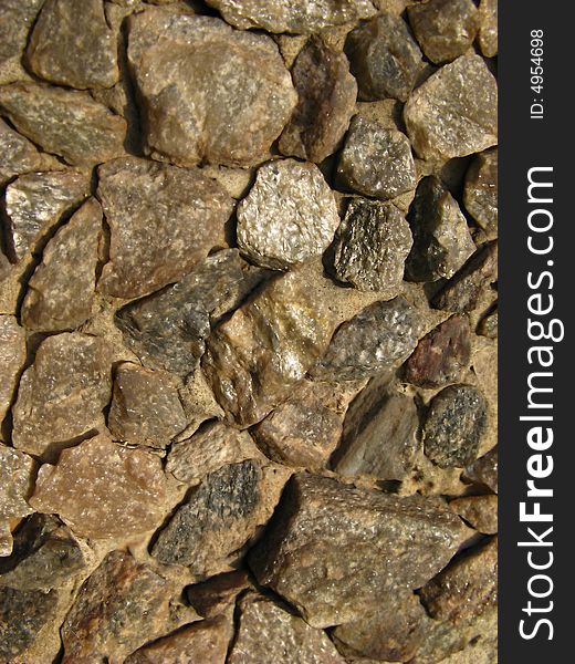 Fragment of wall, surface laid out from stones. Fragment of wall, surface laid out from stones