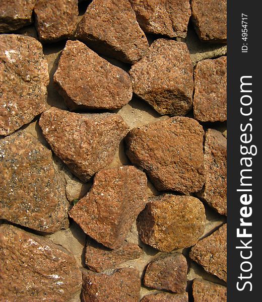 Fragment of wall, surface laid out from stones. Fragment of wall, surface laid out from stones