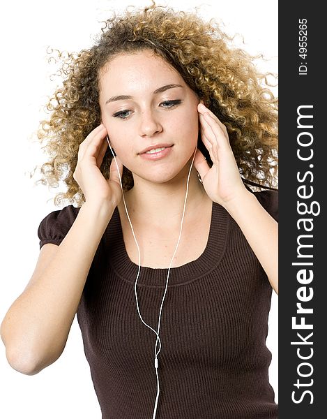 A beautiful young girl chilling out to her music. A beautiful young girl chilling out to her music