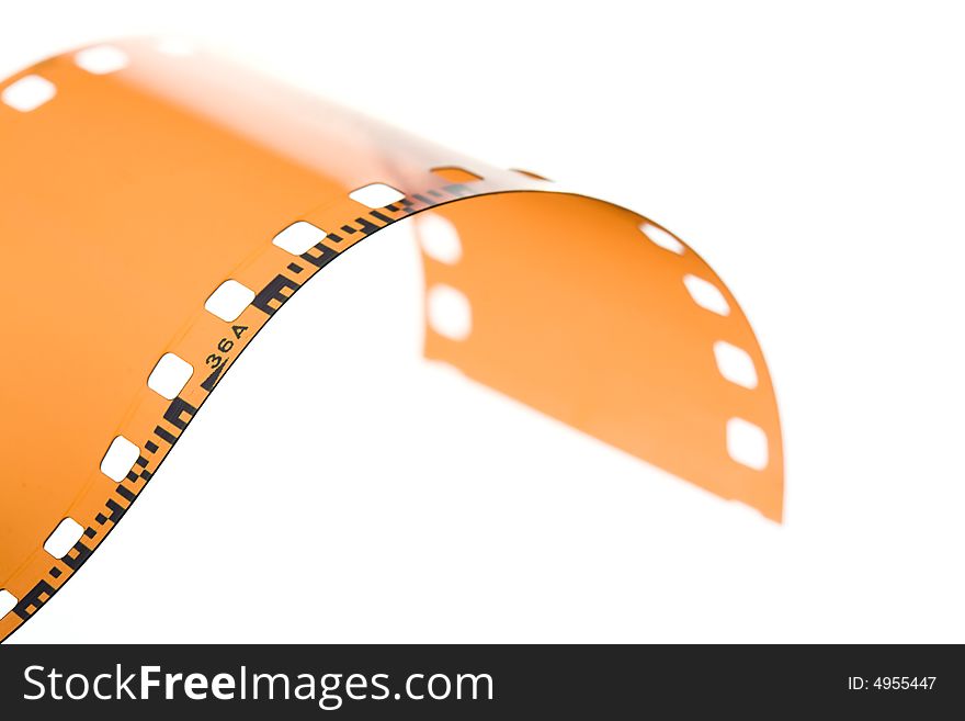 35 mm film strip rolled on white background. 35 mm film strip rolled on white background
