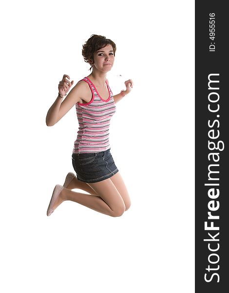 Young attractive girl jumping isolated on a white background