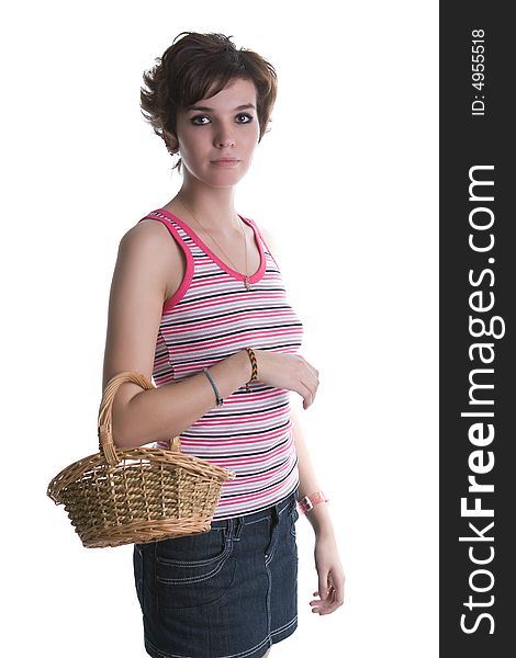 Young attractive girl with a basket on a white background