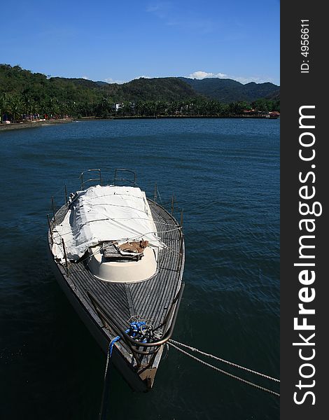 Boat on the blue waters of a resort