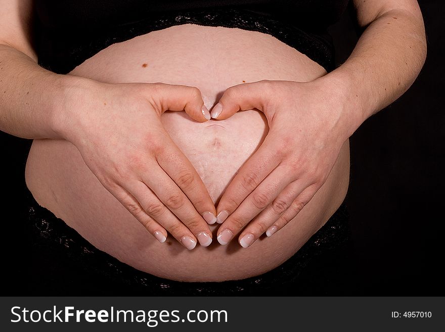 Hands On Pregnant Belly