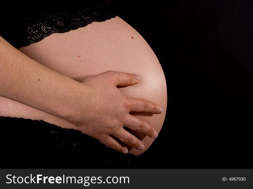Pregnant Belly In The Spotlight