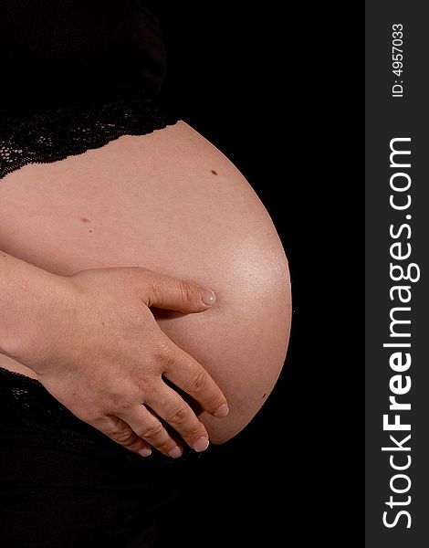 Pregnant Belly In The Spotlight