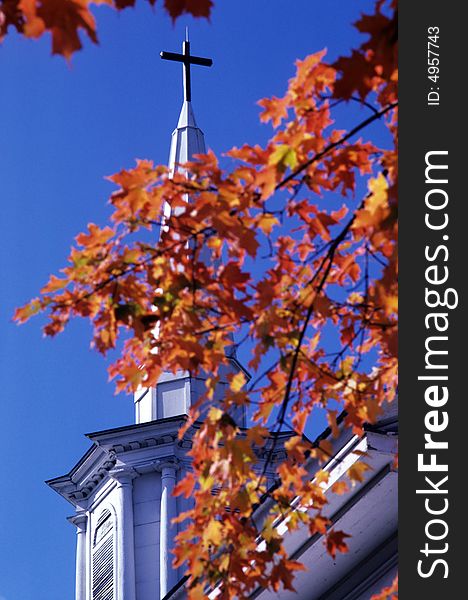 A church steeple in autumn. A church steeple in autumn