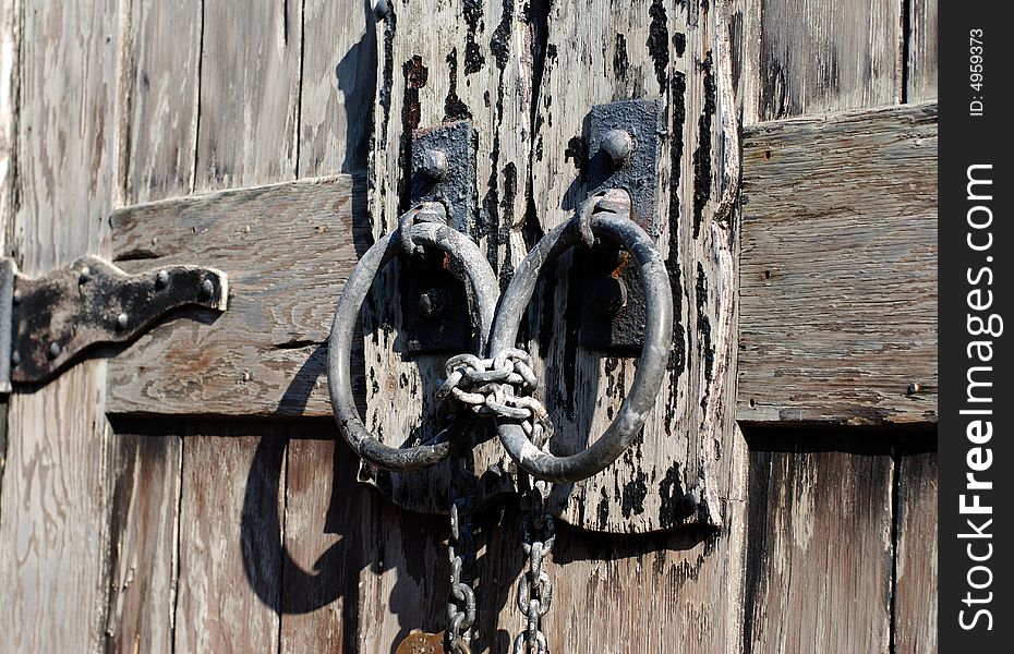 The wooden doors knock bell to  the shipwreck tower (Key  West, Florida). The wooden doors knock bell to  the shipwreck tower (Key  West, Florida).