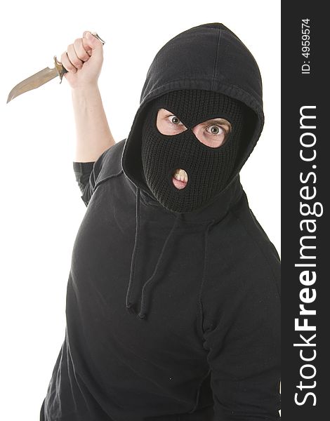 Evil criminal wearing balaclava with a knife