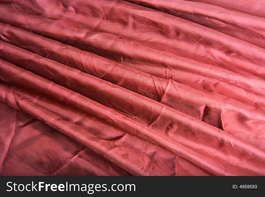 Abstract background red fabric with waves. Abstract background red fabric with waves