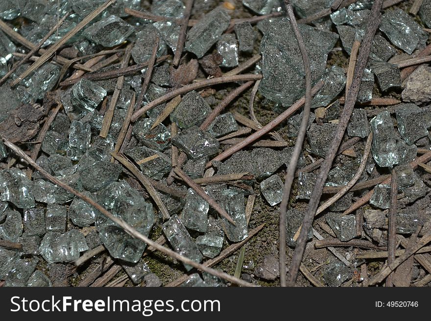 Pieces of glass on the ground. Good background. Pieces of glass on the ground. Good background.