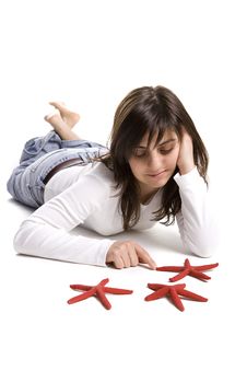 Young Woman Playing With Red Starfish Seashell Stock Photo Young Woman Playing With Red Starfish Seashell Stock Photo