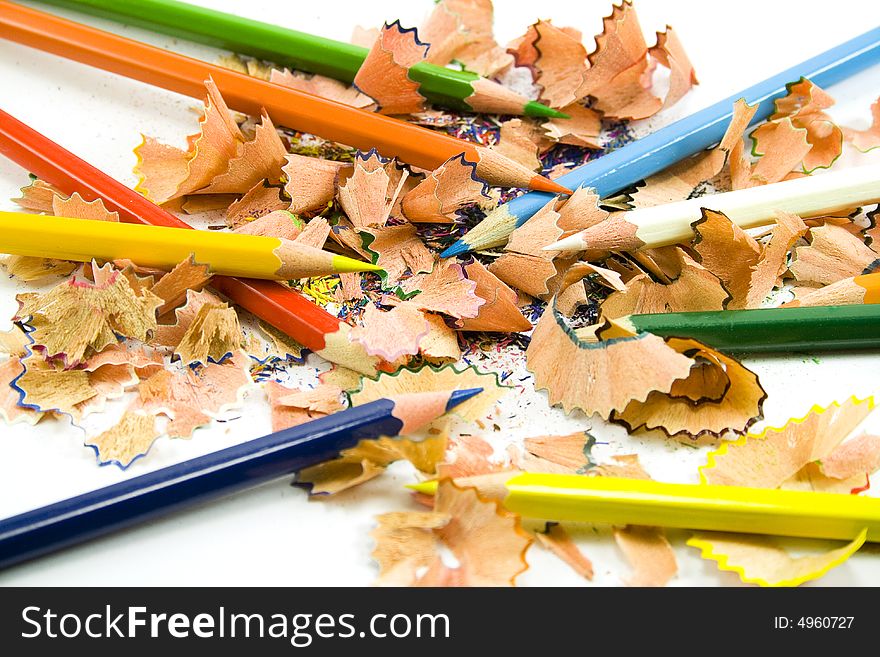 Coloured pencils and sawdust close-up