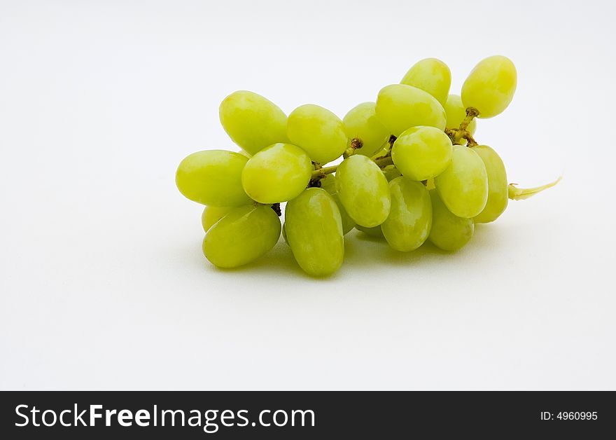 Cluster of grapes on a white background