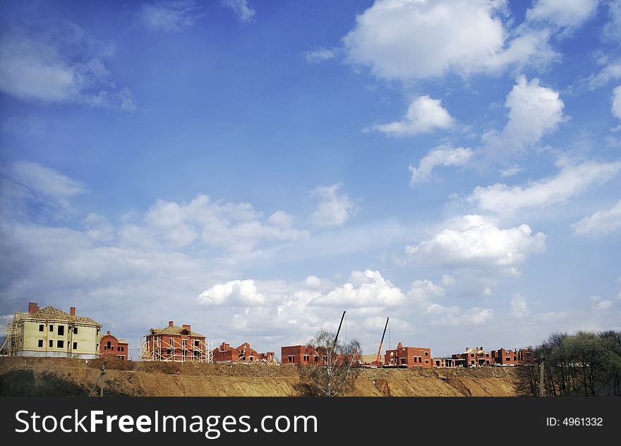 Suburban construction of small house on embankment