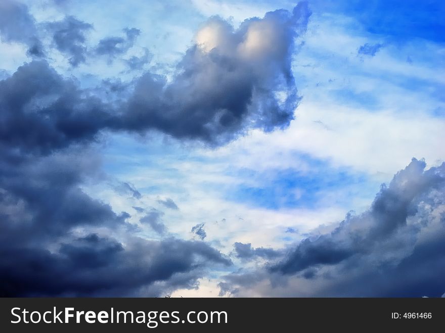 Dark clouds on white sky. Dark clouds on white sky