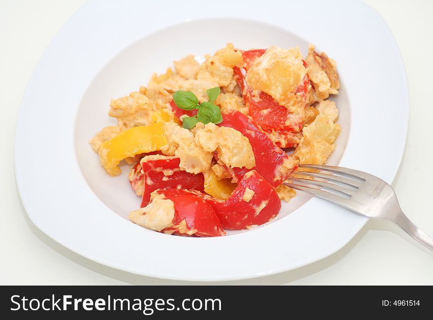 A meal of fresh paprikas and potatoes