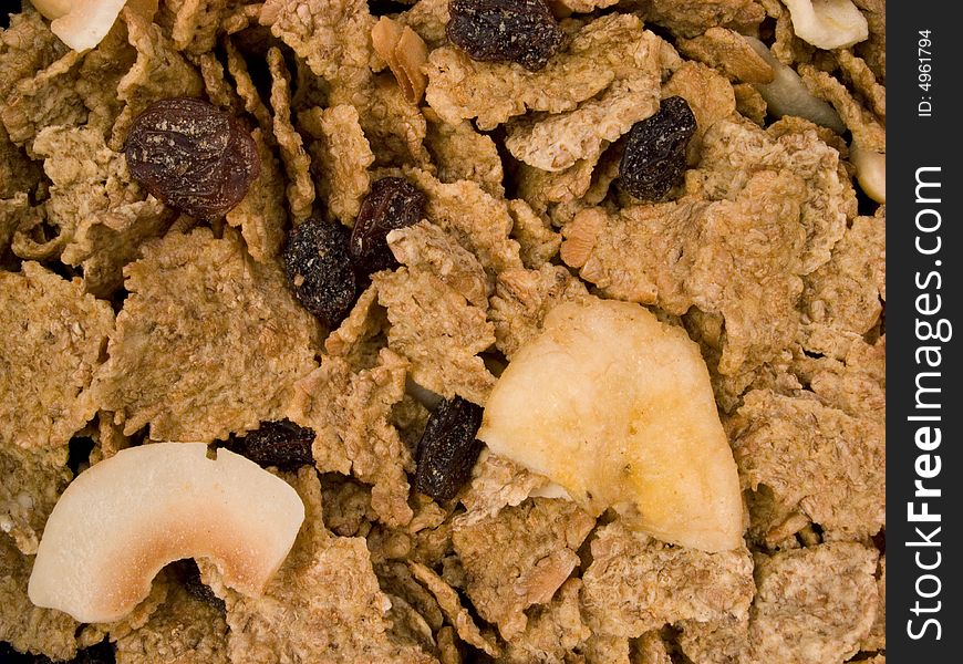 Breakfast cereal flakes with banana, sultanas and nuts