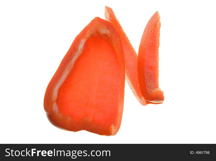 Red pepper with two slices  on white background. Red pepper with two slices  on white background