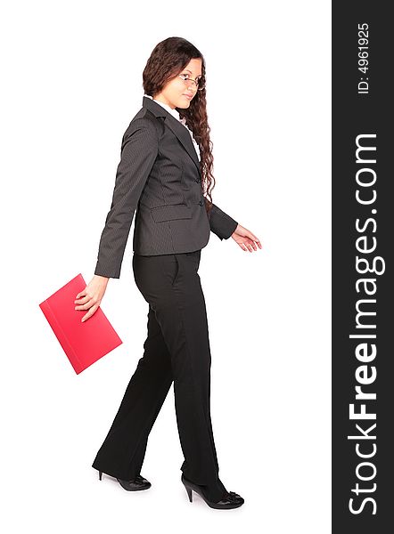 Brown-haired woman goes with red folder