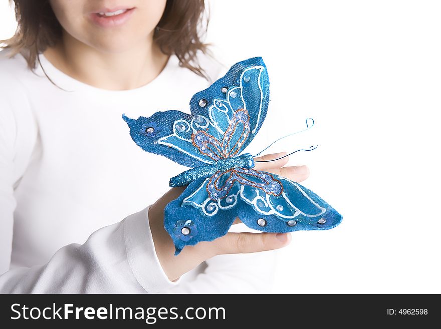 Young woman holding blue butterfly isolated on white background