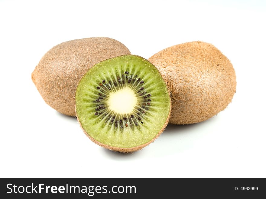 Ripe appetizing kiwi fruits isolated on a white background. Ripe appetizing kiwi fruits isolated on a white background