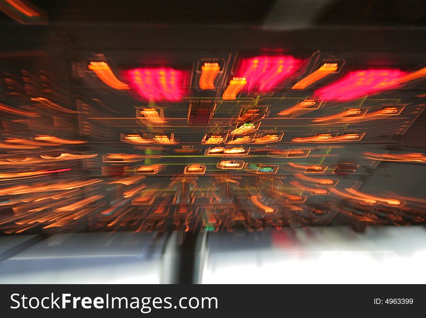 Airplane Upper Instrument Pannel with tunnel effect and blurred ligth. Airplane Upper Instrument Pannel with tunnel effect and blurred ligth.