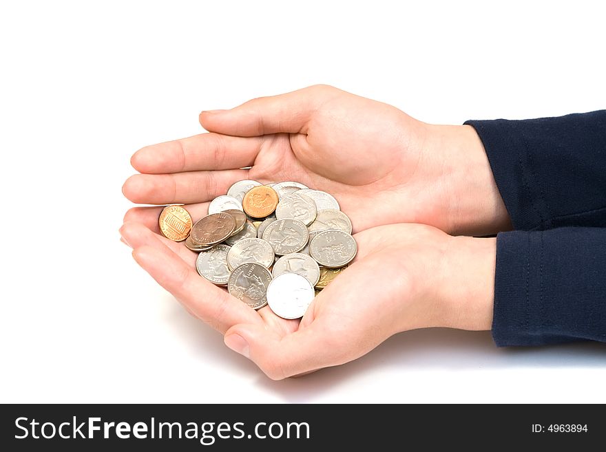 Coins in hand on white background