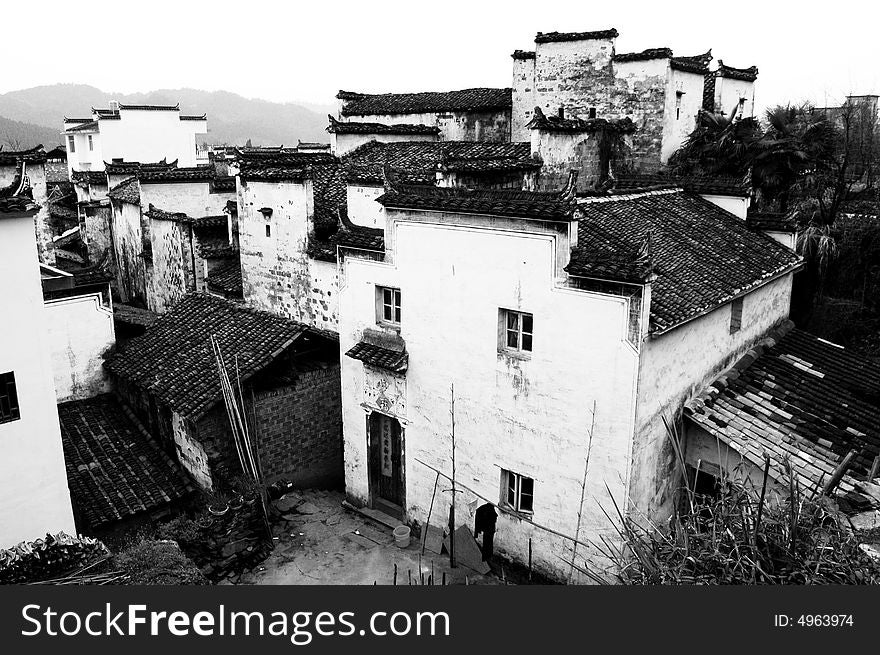 The traditional styled white wall and black tiled roof houses of an ancient village in wuyuan Jiangxi,China. The traditional styled white wall and black tiled roof houses of an ancient village in wuyuan Jiangxi,China.