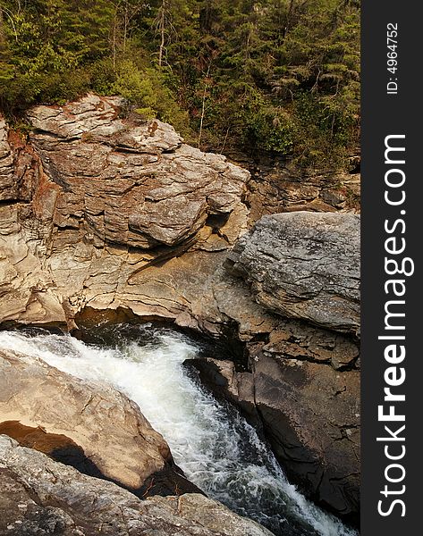 A river of water running through the mountains of North Carolina. A river of water running through the mountains of North Carolina.