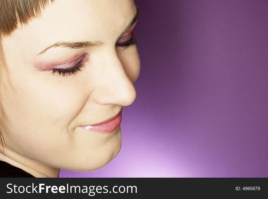 Beauty woman with closed eyes on purple background. Beauty woman with closed eyes on purple background
